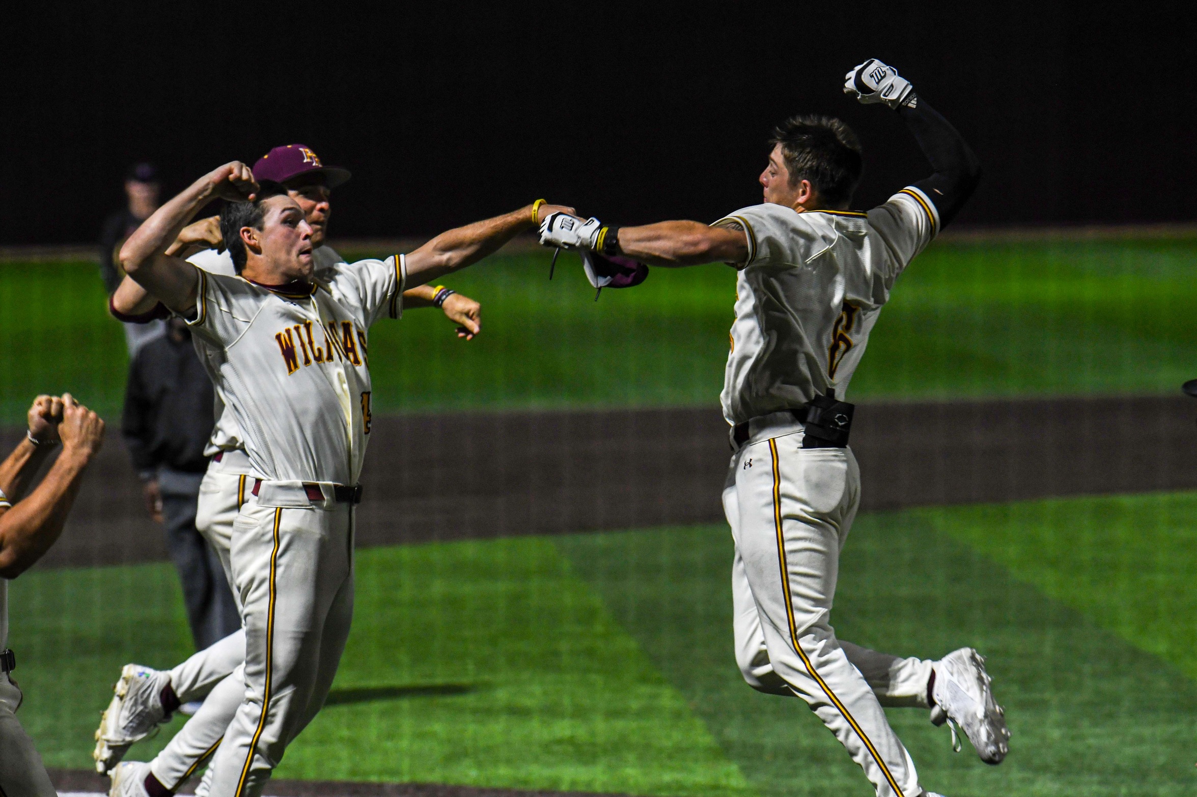 Jacob Keys (Brandon) celebrates with a teammate following his go-ahead, three-run homer against Baton Rouge (Grace Kesler/PRCC Athletics).