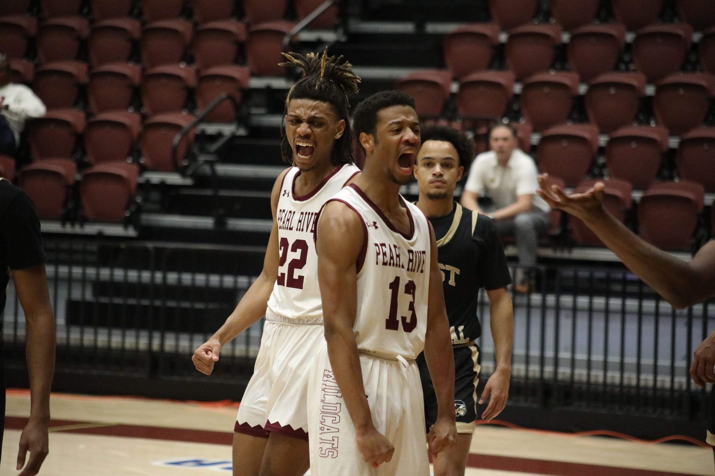 Dylan Brumfield celebrates after getting a layup to fall through contact. (Trenton Gascho)
