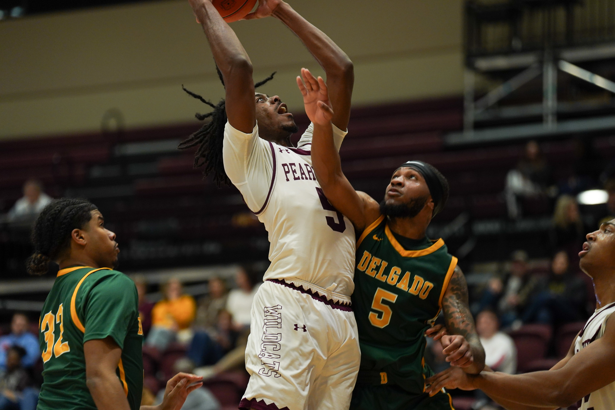 Ezereke Dawson Jr. (Plant City, Fla.) flies toward the basket in Pearl River's 89-62 victory over Delgado.