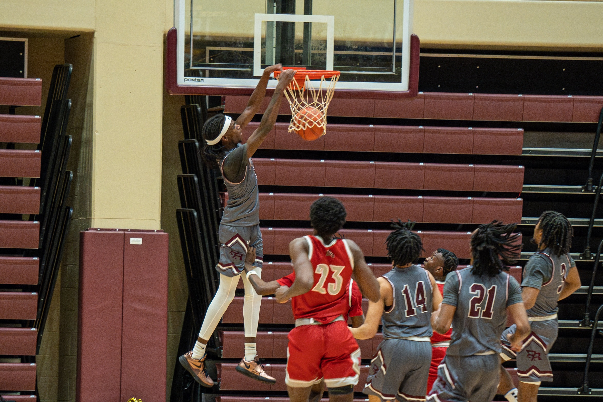 Joah Chappelle (Atlanta, Ga.; Dutchtown) throws down a slam against East Mississippi (Karisa Watkins).