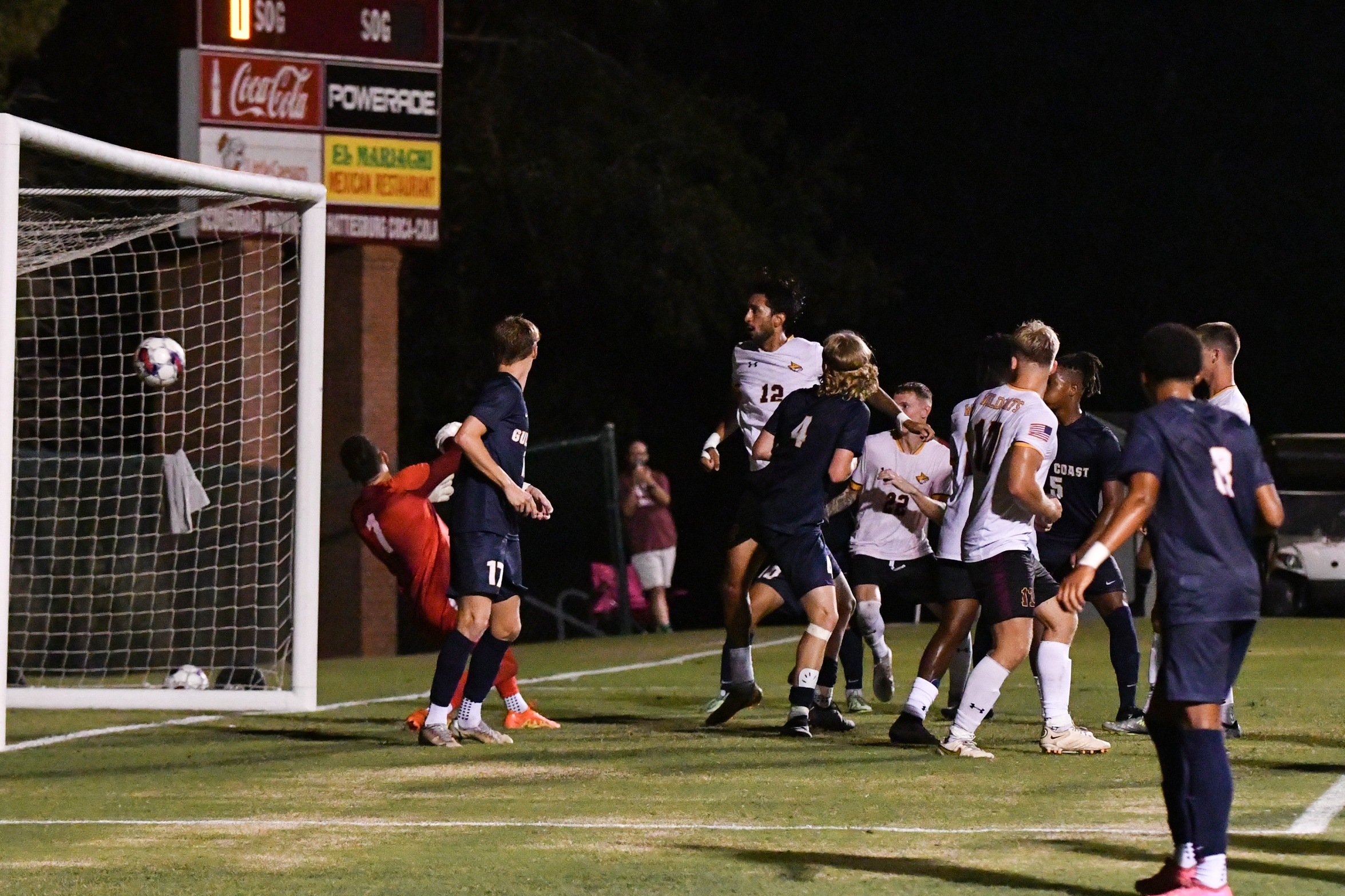 Tiago Honorio Jr. (S&atilde;o Paulo, Brazil) heads home a goal against Gulf Coast (Richard Gleber)