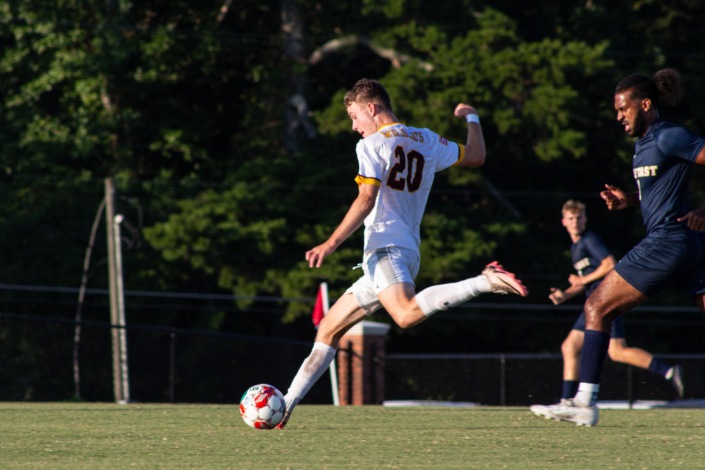 Sebastian Kristensen (Randers, Denmark) strikes the ball against Gulf Coast (Karisa Watkins/PRCC Athletics).