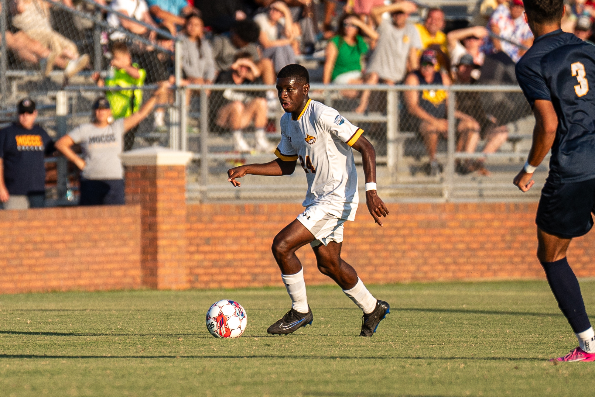 Zach Howard (Ocean Springs) dribbles down the field against Gulf Coast. (River Roderick)