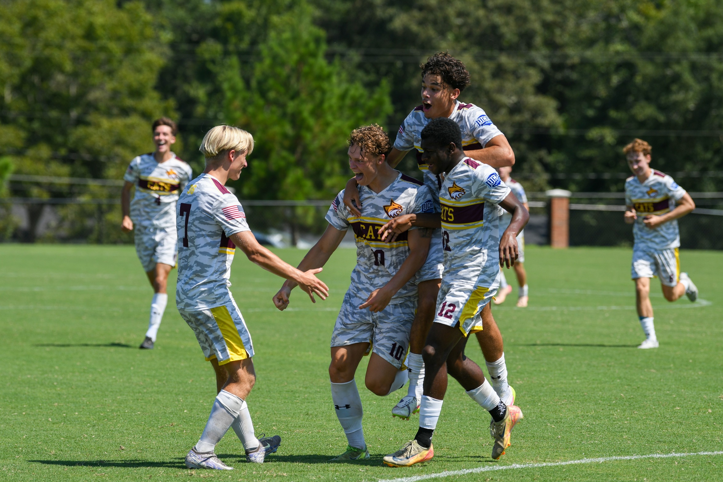 Emil Corfitzen (Copenhagen, Denmark) celebrates with teammates after bagging his first goal of the season. (Melany Carrasco/PRCC Athletics)