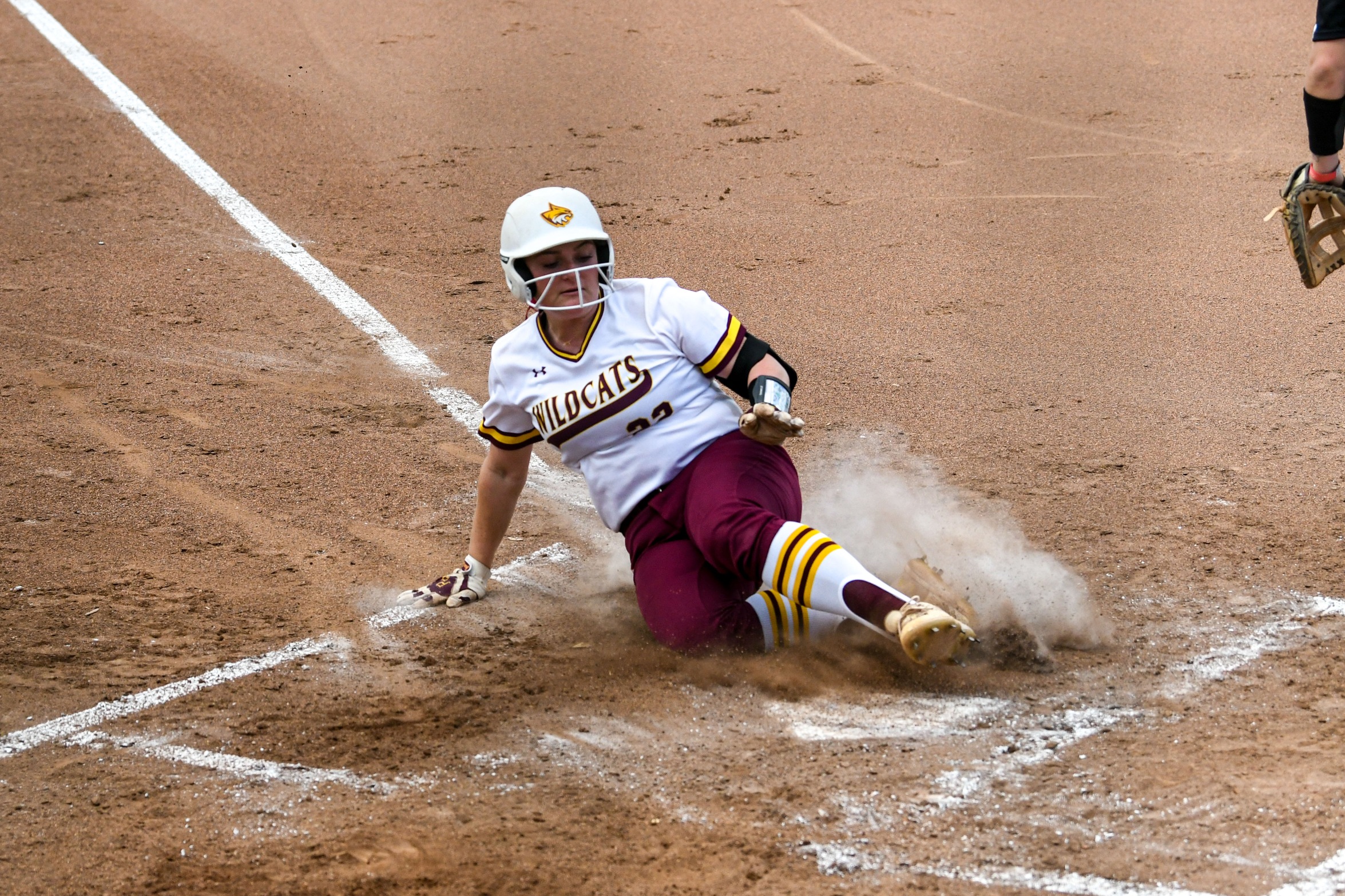 Cailey Pervel (Carriere; Pearl River Central) slides into home plate in Pearl River's sweep of East Central (Hannah Mills/PRCC Athletics).