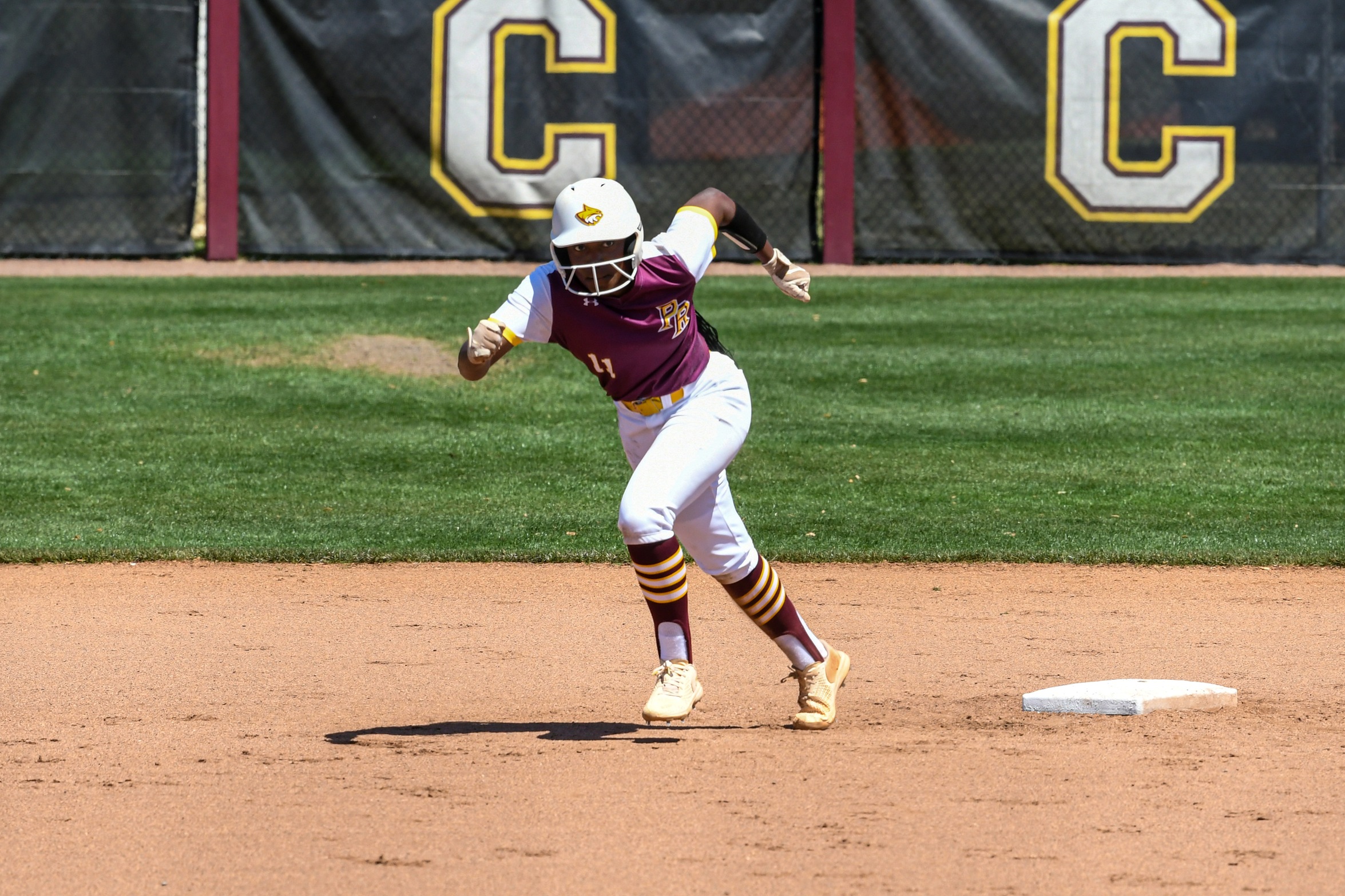 Kai Goodman (New Orleans, La.; John Curtis) steals her record-breaking 35th base of the year (Melany Carrasco/PRCCAthletics).
