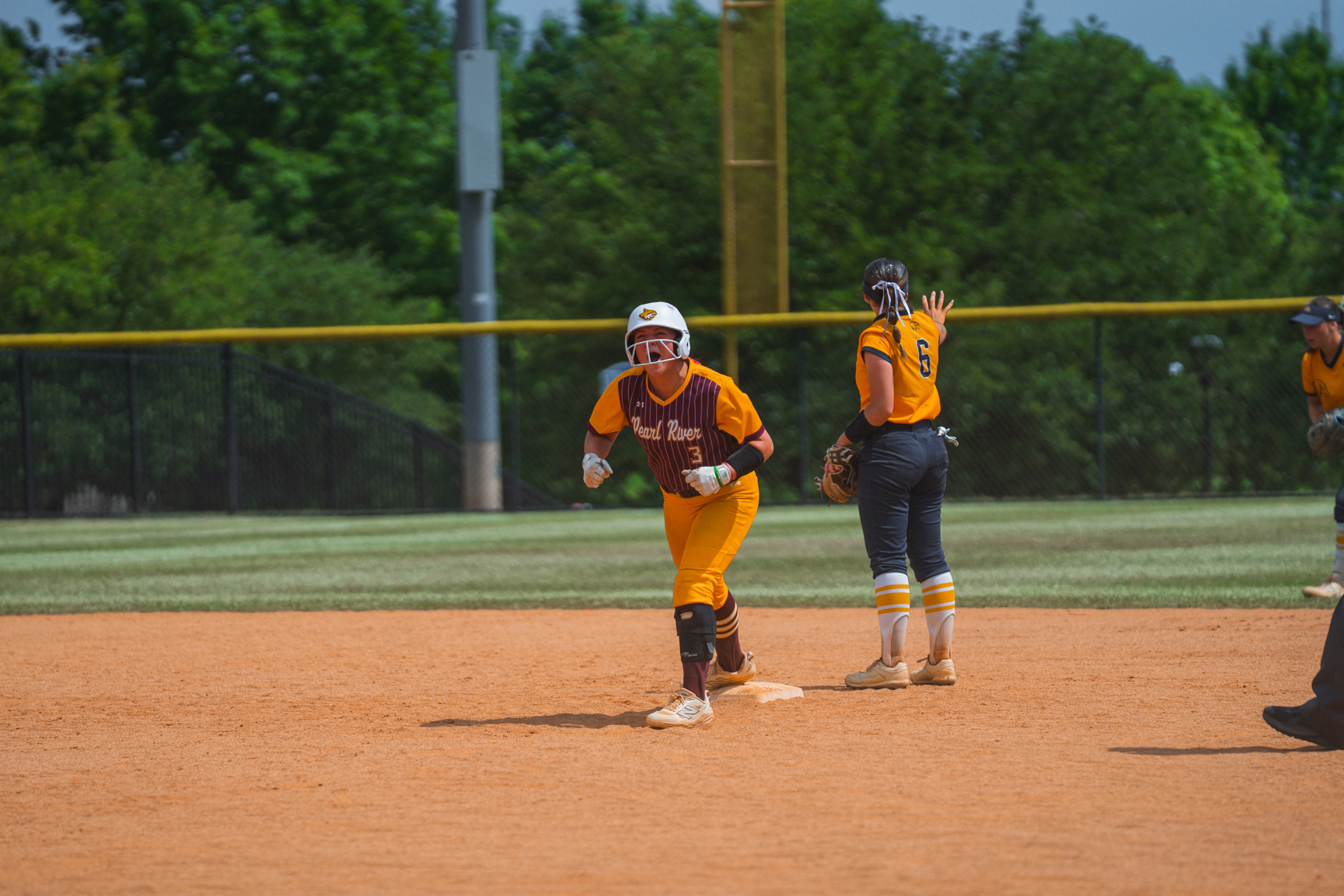 Jaycee Holifield (Laurel; Stringer) celebrates after a two-run double against Rock Valley. (Grant McLeod/PRCC Athletics)
