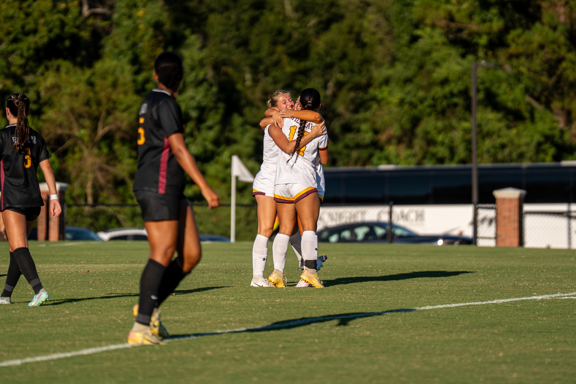 Addy Grace Alexander (Poplarville) hugs her teammates after scoring the opening goal against No. 11 Jones College (Karisa Watkins/PRCCAthletics).