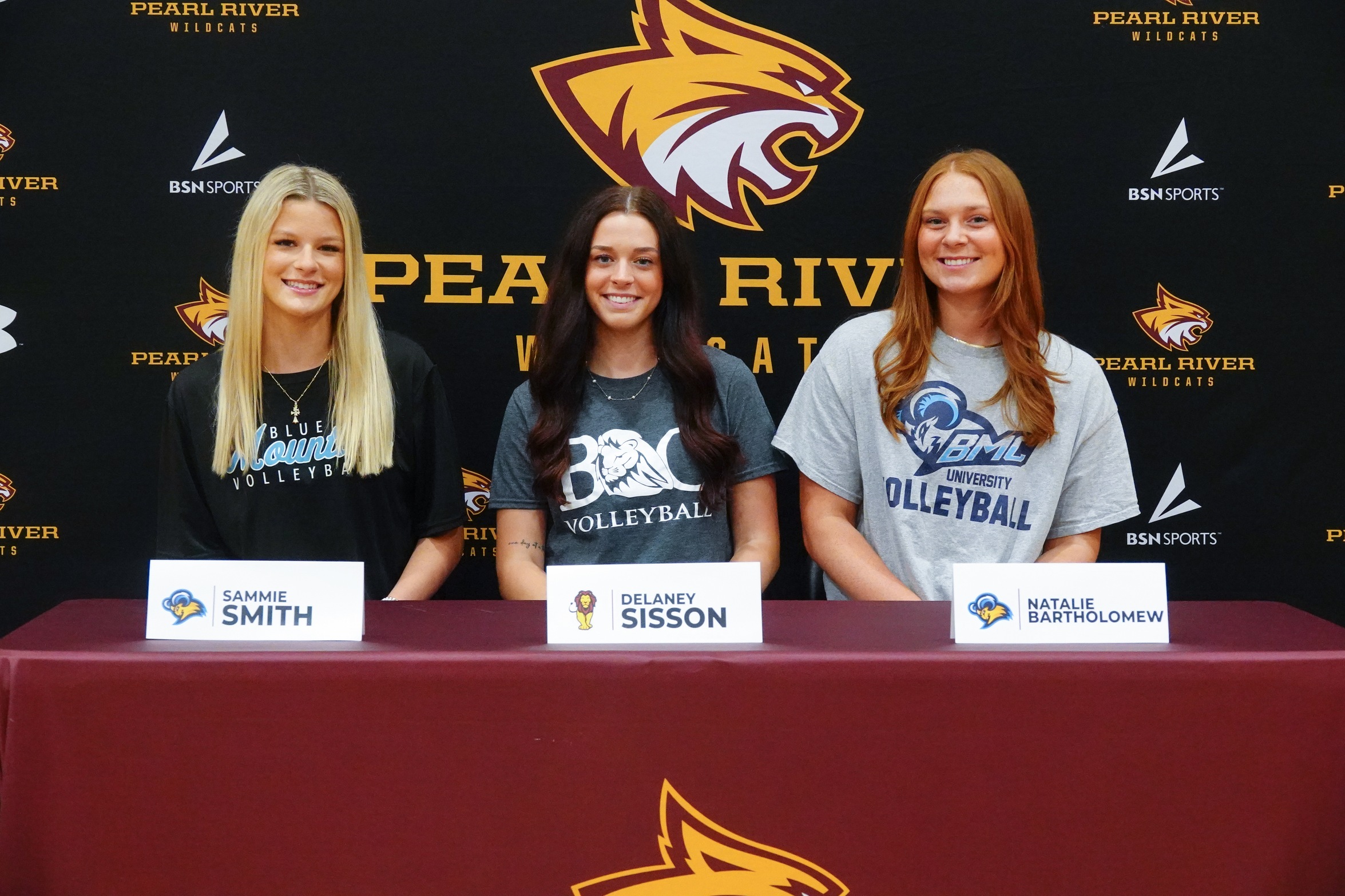 Three volleyball Wildcats sign with four-year programs