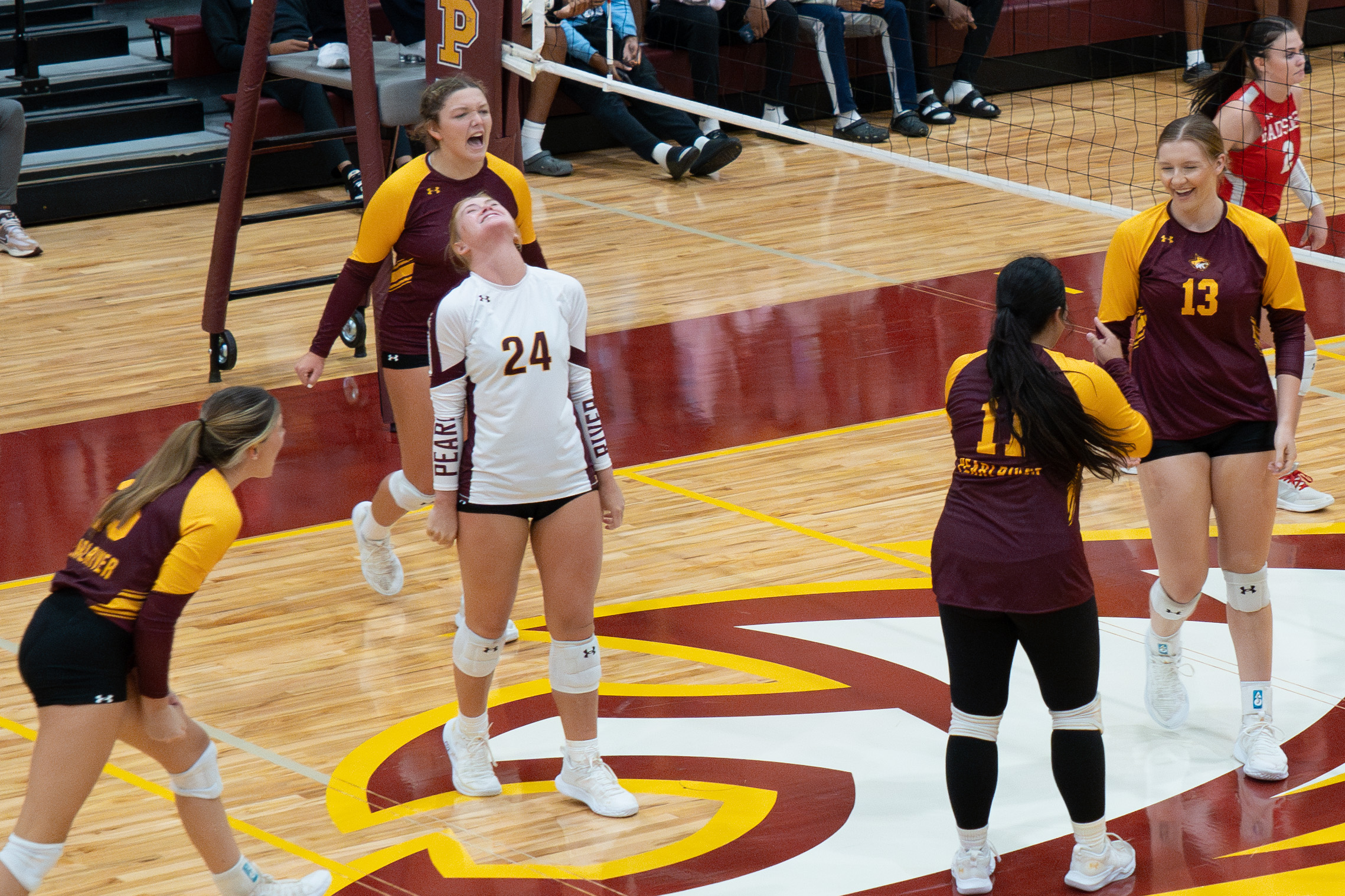 Pearl River celebrates after a point against Gadsden State (Karisa Watkins/PRCCAthletics)