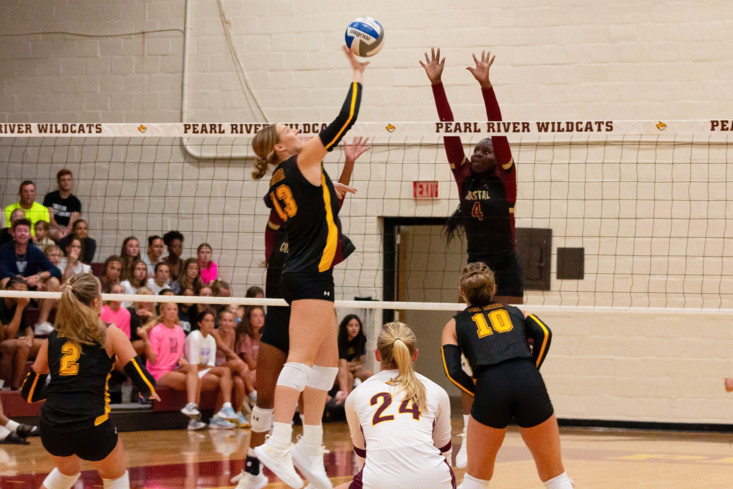 Pearl River volleyball fights hard for split