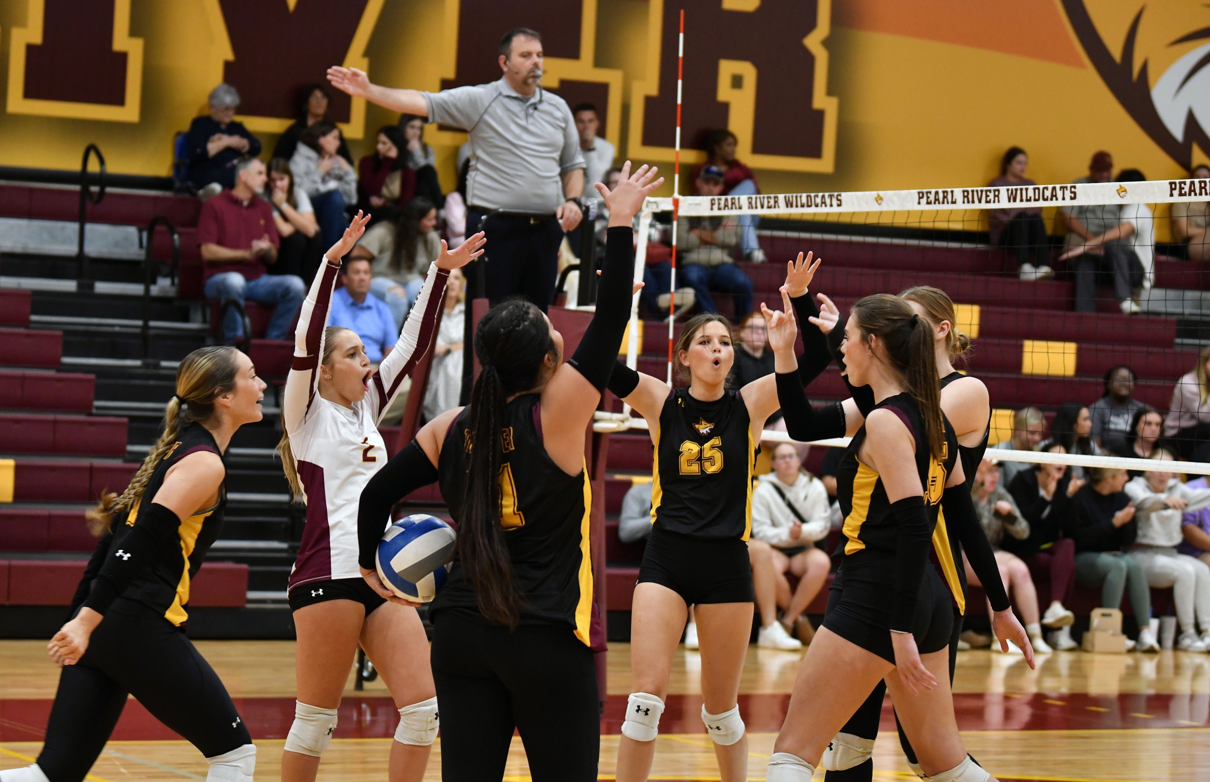 Pearl River volleyball celebration. 
